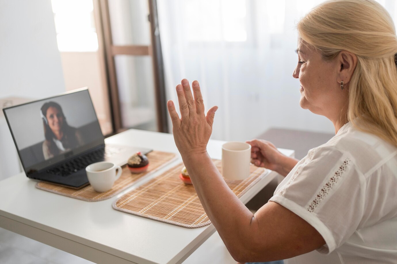 side-view-woman-quarantine-having-drink-with-friends-laptop_23-2148740960 (1)